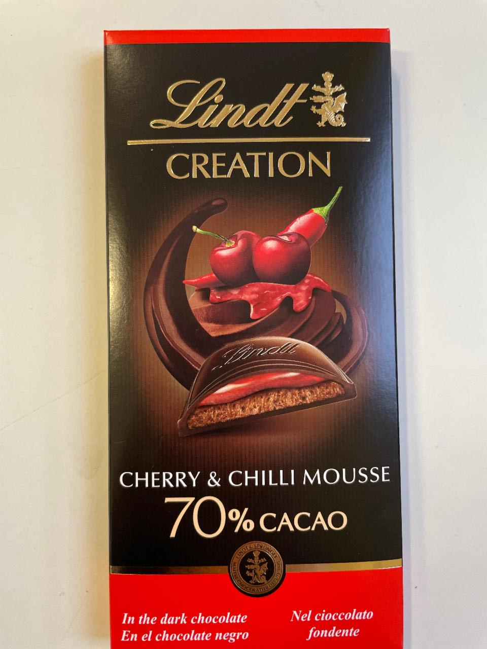 Zdjęcia - Creation 70% Cocoa Gorzka czekolada z musem czekoladowym i nadzieniem wiśniowym z chilli Lindt