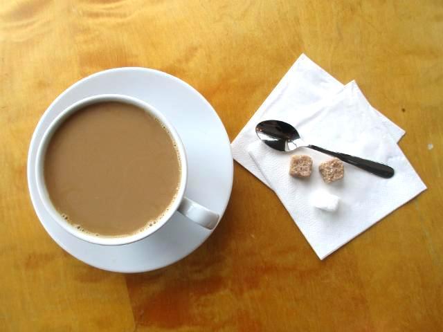 Zdjęcia - Kawa z mlekiem i cukrem