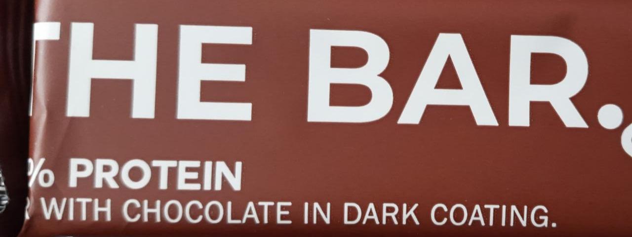 Zdjęcia - The bar with chocolate in dark coating Ostrovit