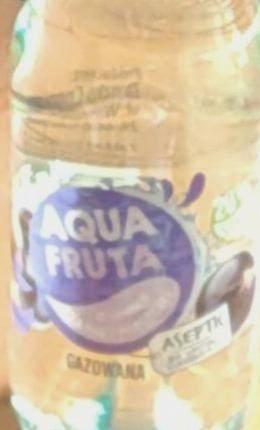 Zdjęcia - Woda o smaku porzeczkowym Aqua Fruta