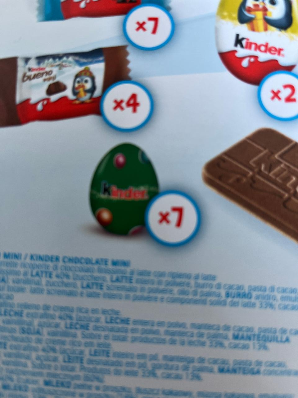 Zdjęcia - Kinder Mini Eggs Czekoladki z mlecznej czekolady z mlecznym nadzieniem i orzechami laskowymi 85 g