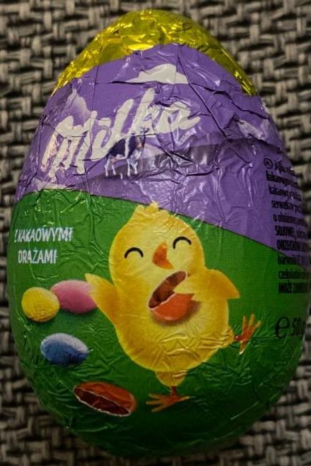 Zdjęcia - Milka Jajko z czekolady mlecznej z kakaowymi drażami 50 g