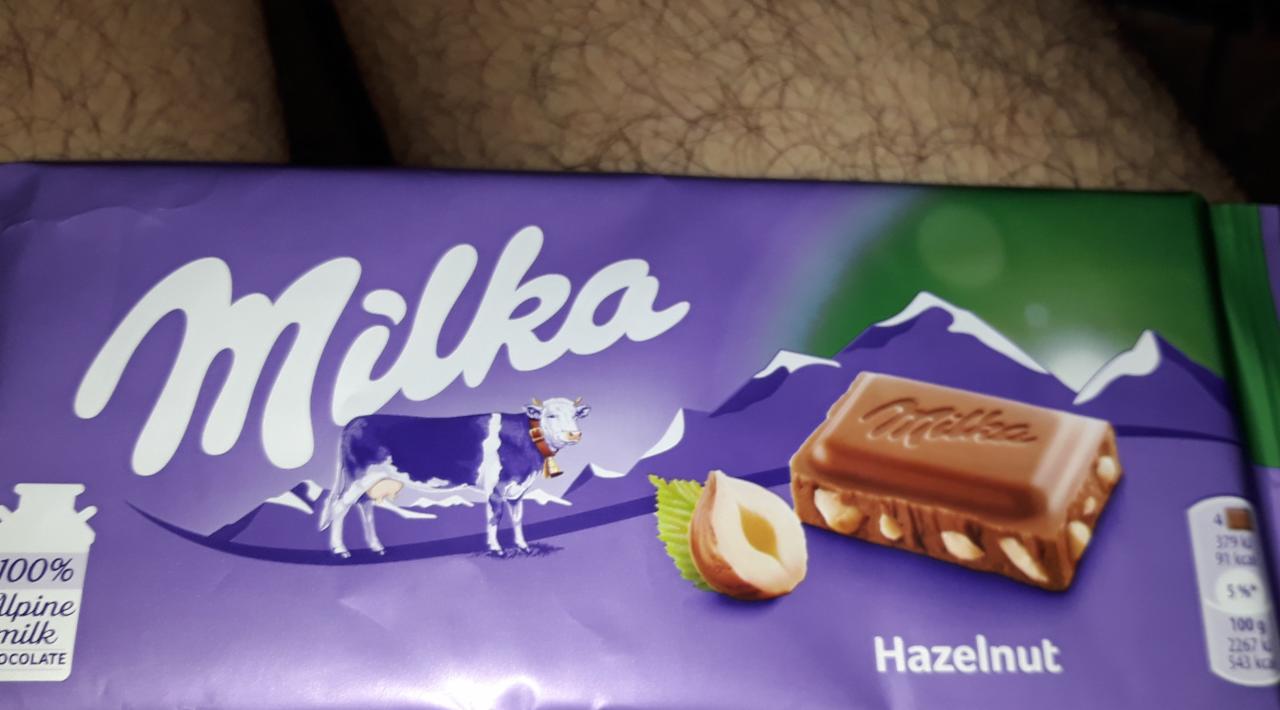 Zdjęcia - Milka Czekolada mleczna z kawałkami orzechów 100 g