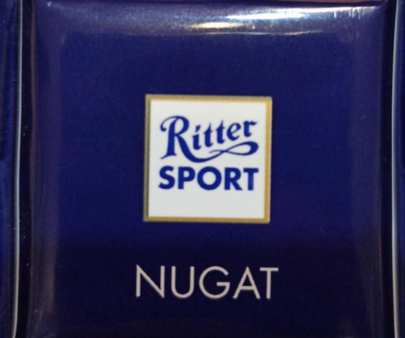 Zdjęcia - Czekolada mleczna z nadzieniem nugat z orzechów laskowych Ritter Sport