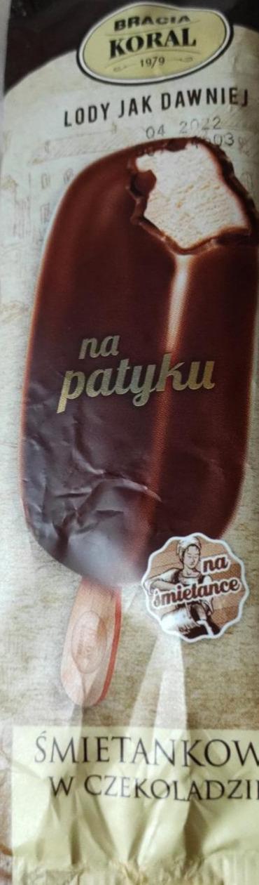 Zdjęcia - Lody jak dawniej na patyku o smaku śmietankowym w czekoladzie Koral