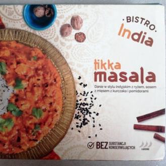 Zdjęcia - Danie w stylu indyjskim z ryżem, sosem i mięsem z kurczaka Tikka Masalla Bistro India
