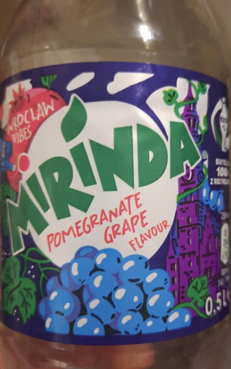 Zdjęcia - Mirinda Napój gazowany o smaku granatu i winogron 0,5 l