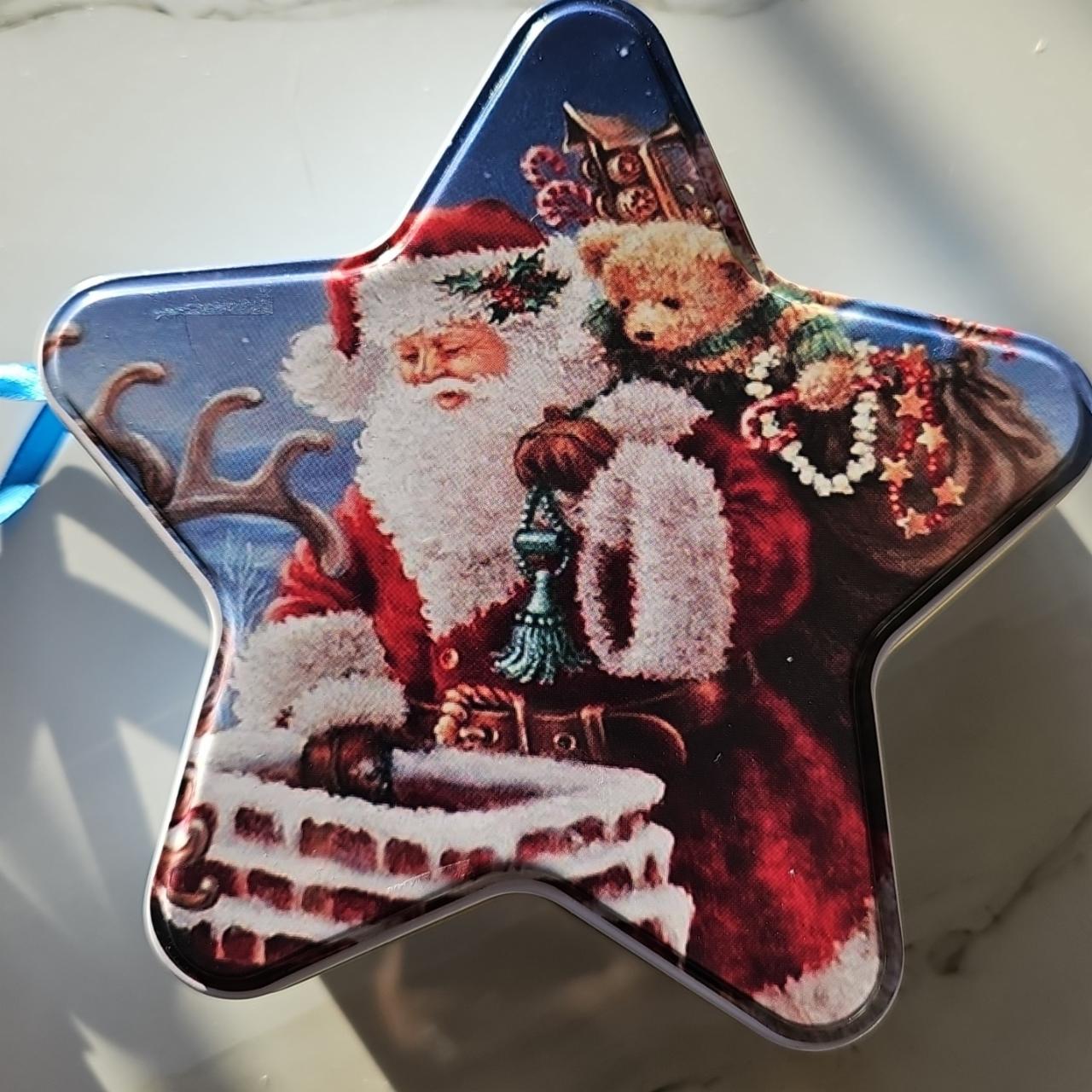 Zdjęcia - Puszka świąteczna z pralinami z czekolady mlecznej z nadzieniem z płatków zbożowych Rakpol