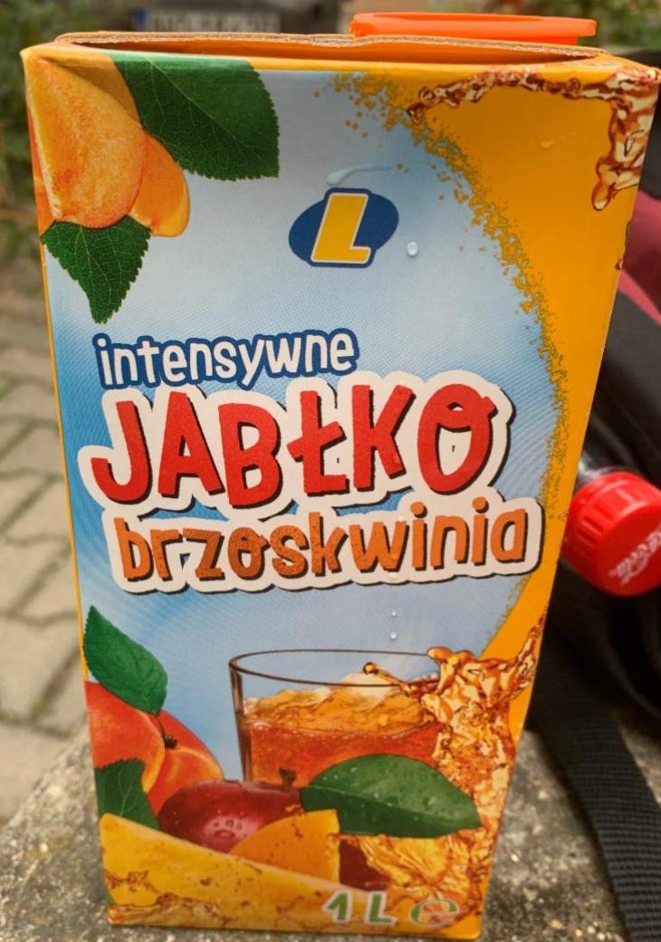 Zdjęcia - Napój jabłko-brzoskwinia Lewiatan