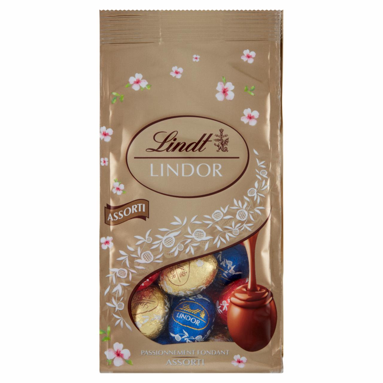 Zdjęcia - Lindt Lindor Pralinki z czekolady mlecznej deserowej i białej z nadzieniem 180 g