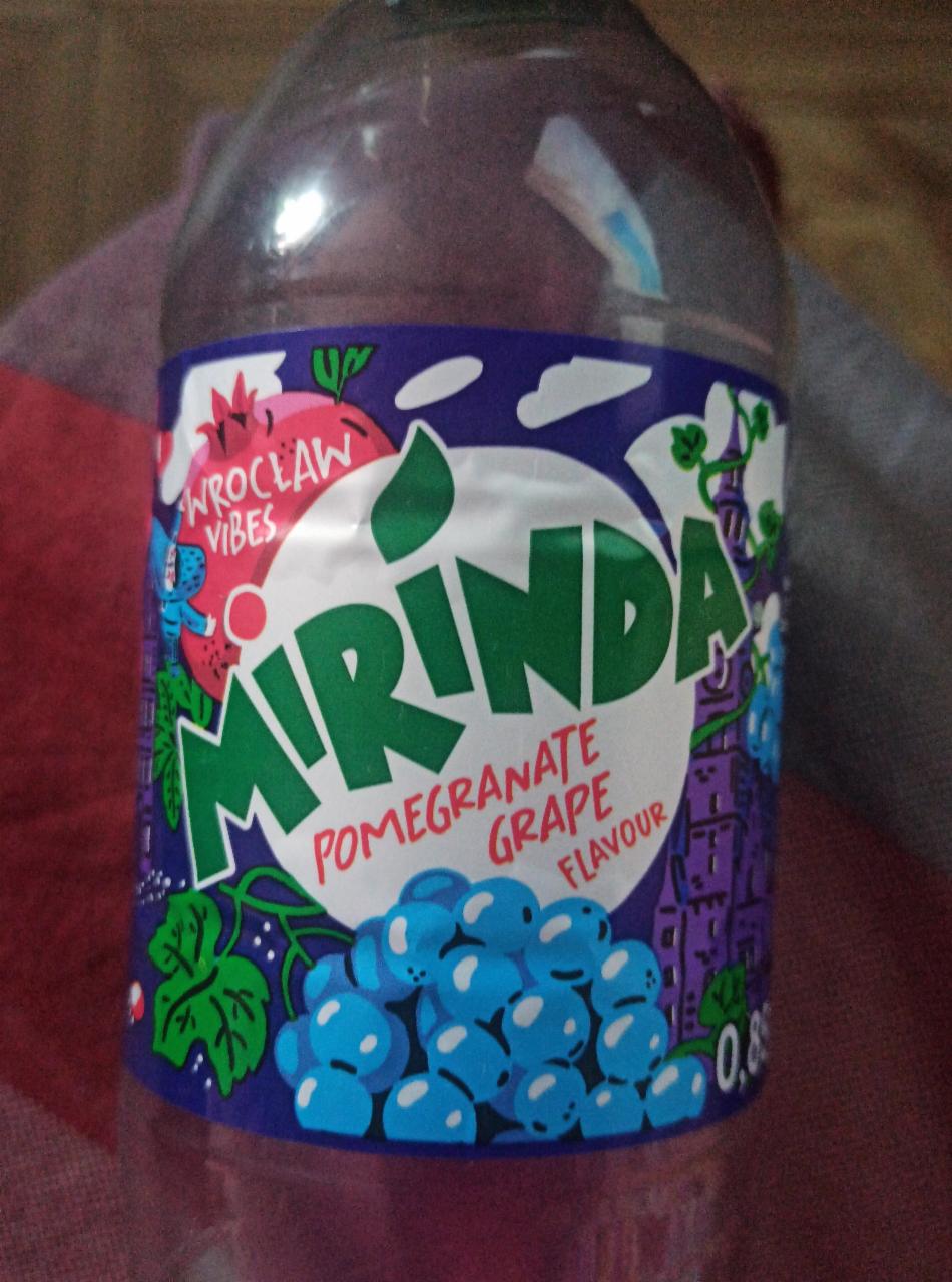 Zdjęcia - Mirinda Napój gazowany o smaku granatu i winogron 0,85 l