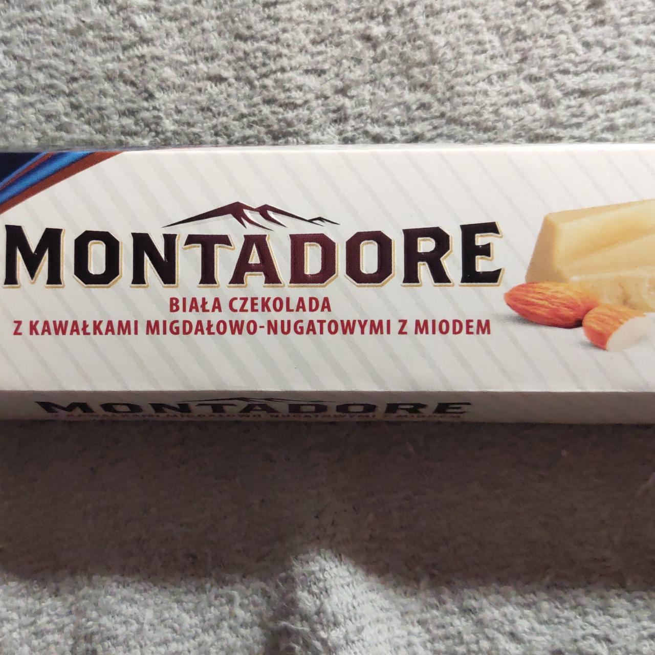 Zdjęcia - Biała czekolada z kawalkami migdalowo-nugatowymi z miodem Montadore